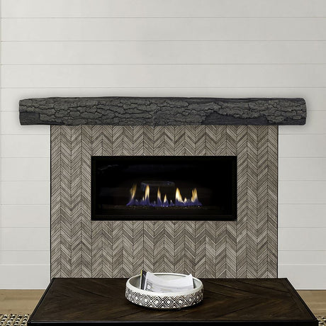 half round sleeper eclipse mantel on a shiplap wall