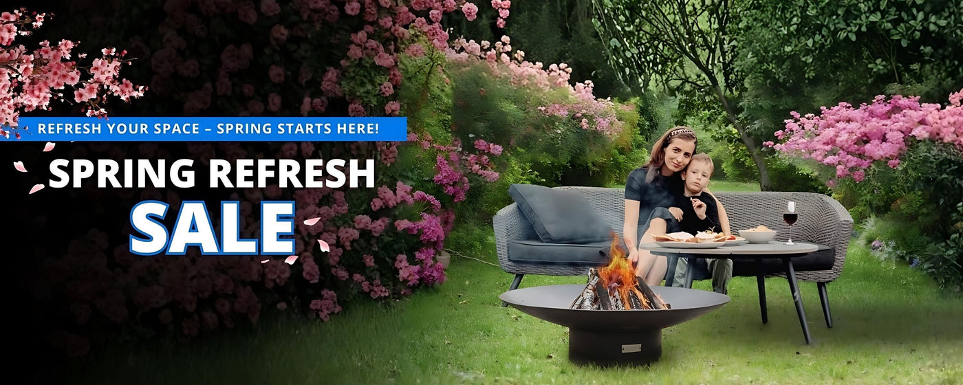 Mother and child sitting in front of a wood burning fire pit outdoors