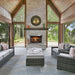 Majestic Vesper Vent-Free Outdoor Gas Fireplace in a cozy cabin styled patio