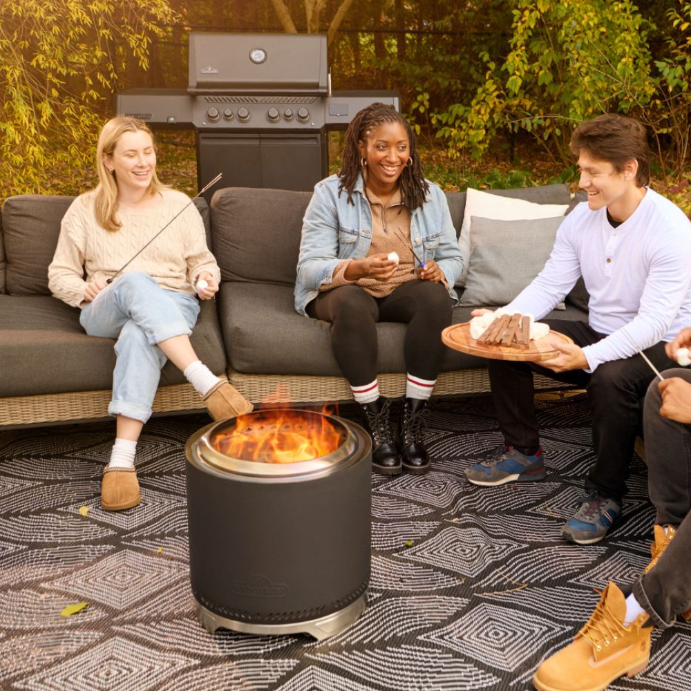 Napoleon Timberwolf 18-Inch Fire Pit Being Use for Outdoor Gathering
