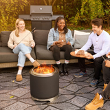 Napoleon Timberwolf 18-Inch Fire Pit Being Use for Outdoor Gathering
