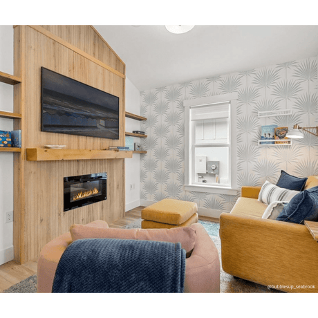 Touchstone Sideline 36-Inch recessed electric fireplace installed in a room