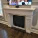 Omega 1110.511 GS Cast Stone Fireplace Mantel Surround in a living room