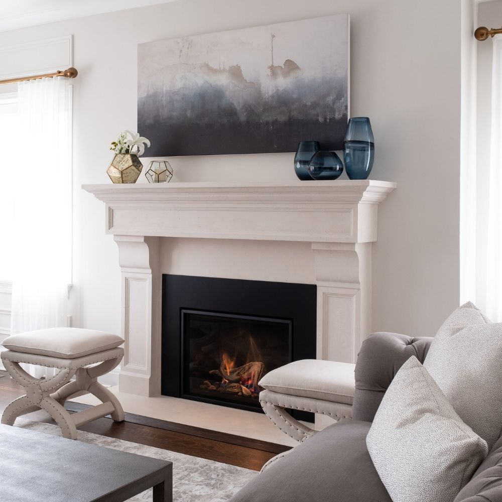 Omega 1111.511 GS Cast Stone Fireplace Mantel Surround in a bright and airy living space