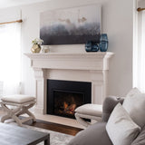 Omega 1111.511 GS Cast Stone Fireplace Mantel Surround in a bright and airy living space