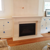 Omega 1111.556 GS 77-Inch Cast Stone Fireplace Mantel Surround in a living room