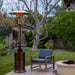 patio comfort pc02cab vintage propane patio heater beside a fire pit