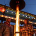 a couple spending time by the patiofyre metro jetlamp pellet patio heater