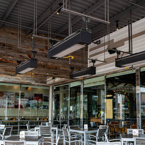 Sunpak S25 Wall/Ceiling Mounted Black Infrared Gas Heater at a restaurant