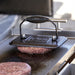 grilling smash burgers on the top fires the overlander portable grill