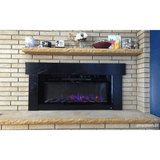 Touchstone Sideline 45 electric fireplace installed in a brick fireplace surround with a wood mantel