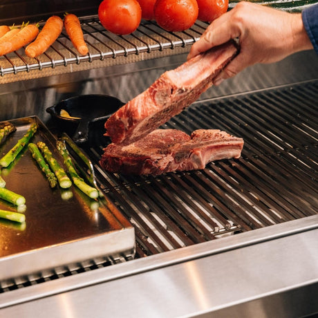 Grilling steaks on the American Made Grills Estate 30 Gas Grill