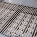 American Made Grills Estate 30 Gas Grill ceramic briquette system under the grid