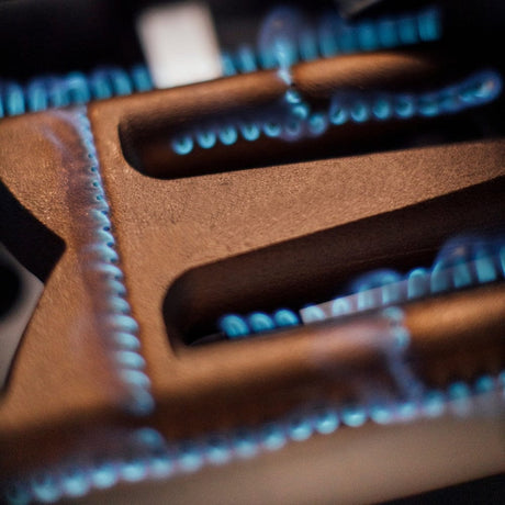 american made grills red brass burners turned on