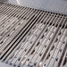 American Made Grills Estate 42 Gas Grill ceramic briquette system under the grid