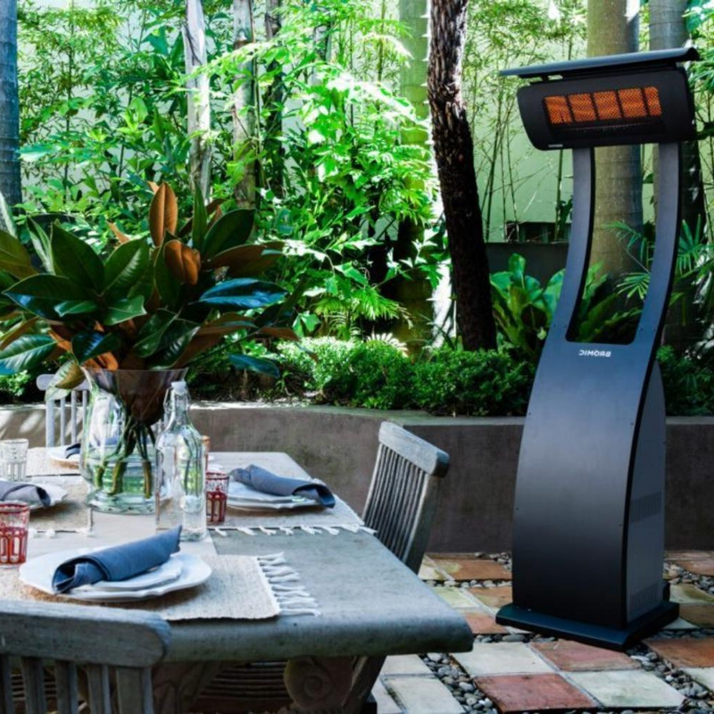 Bromic Tungsten Portable Heater in an al fresco dining setting