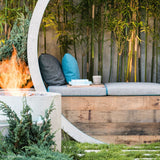 ecosmart fire ab series ethanol burner in a backyard oasis