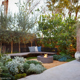 EcoSmart Fire Ark 39-Inch Round Concrete Gray Fire Pit Table in a patio