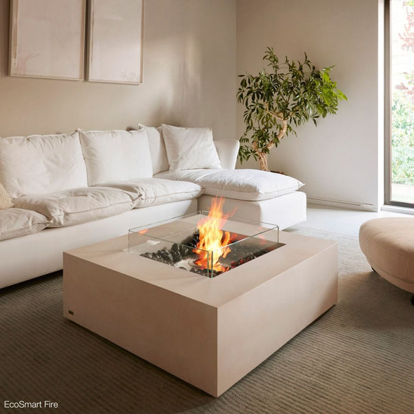 EcoSmart Fire Base 40-Inch White Square Fire Pit Table in a living room