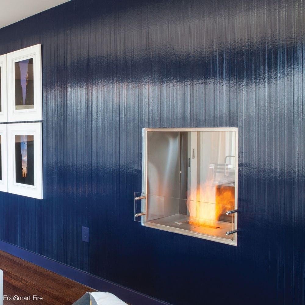 EcoSmart Fire Flex Double Sided Ethanol Firebox in a blue wall
