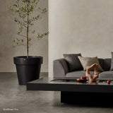 black ecosmart fire gin fire pit table in a japandi inspired living room