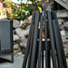 black EcoSmart Fire Stix 22-Inch Portable Ethanol Fire Pit in a backyard