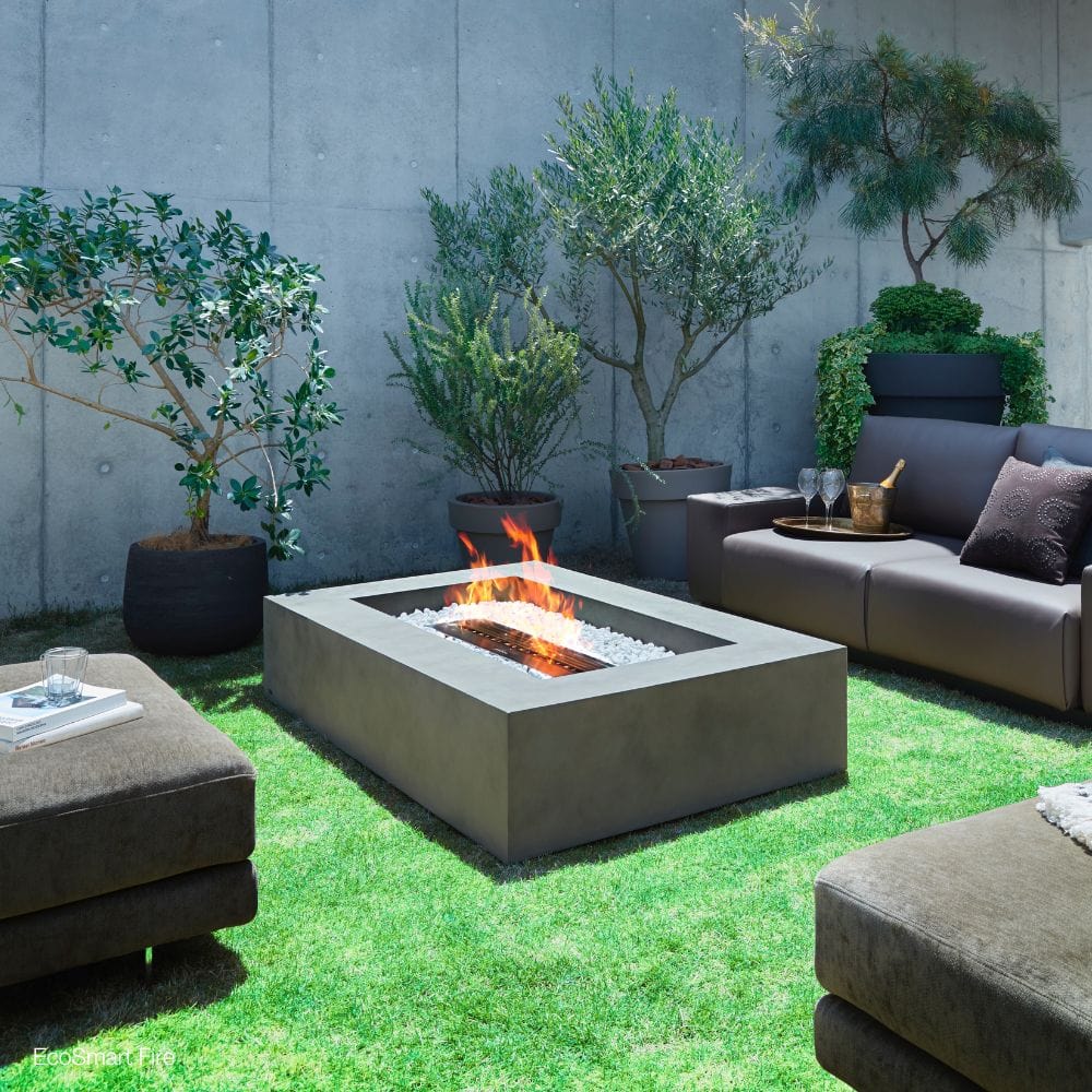 ecosmart fire wharf ethanol fire pit table in a patio
