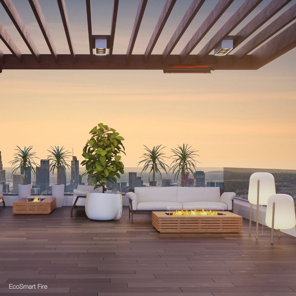 ecosmart fire wharf teak ethanol fire pit table on a rooftop with city view