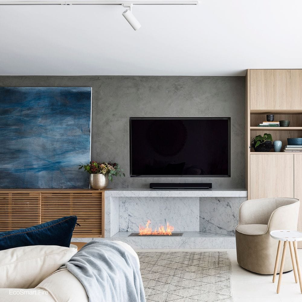 EcoSmart Fire XL700 Ethanol Fireplace Burner in an open fireplace