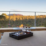 EcoSmart Fire XL700 Ethanol Fireplace Burner installed on a wooden table