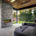 Fire Garden Linear Vent-Free See-Through Outdoor Natural Gas Fireplace in a brick enclosure