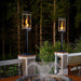 Fire Garden Tempest 20k 8-Inch Outdoor Torch mounted on a pedestal