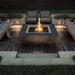 Fire Garden Voracious Fire Square Gas Fire Pit Burner in a cozy patio space