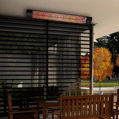 Innova 6000W 61-Inch Dual Element Infrared Electric Heater at an outdoor dining area