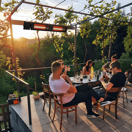 King Electric SmartWave Infrared Radiant Patio Heater is installed at a patio dining gathering.