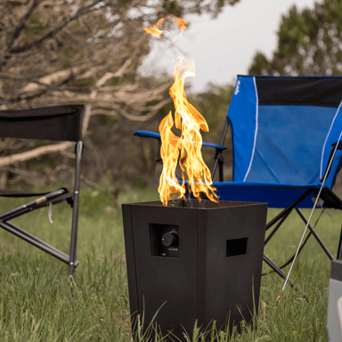 Live Outdoor Firestorm Series I Fire Pit with Burner On at Campsite