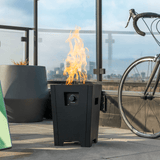 Live Outdoor Firestorm Series I Fire Pit with Burner On on the Outdoor Patio