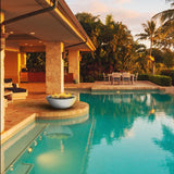 modern blaze white fire bowl placed by the pool
