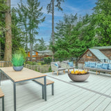 modern blaze off white gas fire bowl placed on a patio deck