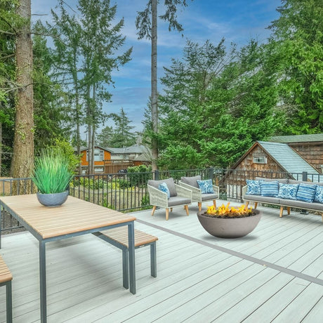 modern blaze off white gas fire bowl placed on a patio deck