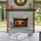 Majestic Vesper outdoor fireplace with the Lumonessen burner and logs lit on a screened porch
