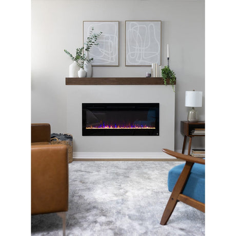 Touchstone Sideline 45 electric fireplace in a styled living room below a wood mantel