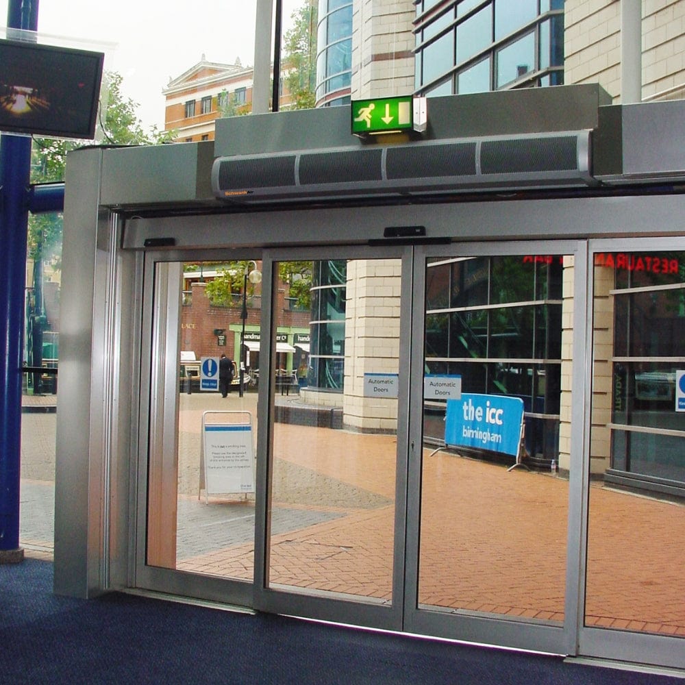 Schwank Breeze8 Wall-Mounted Air Curtain With Heat above an entrance