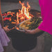 grilling corn and vegetables on the seasons fire pit grill
