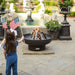 children celebrating 4th of july with the seasons fire pits elliptical steel fire pit