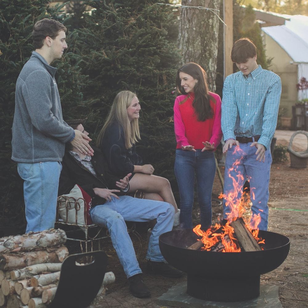 gathering around the seasons fire pits elliptical steel fire pit