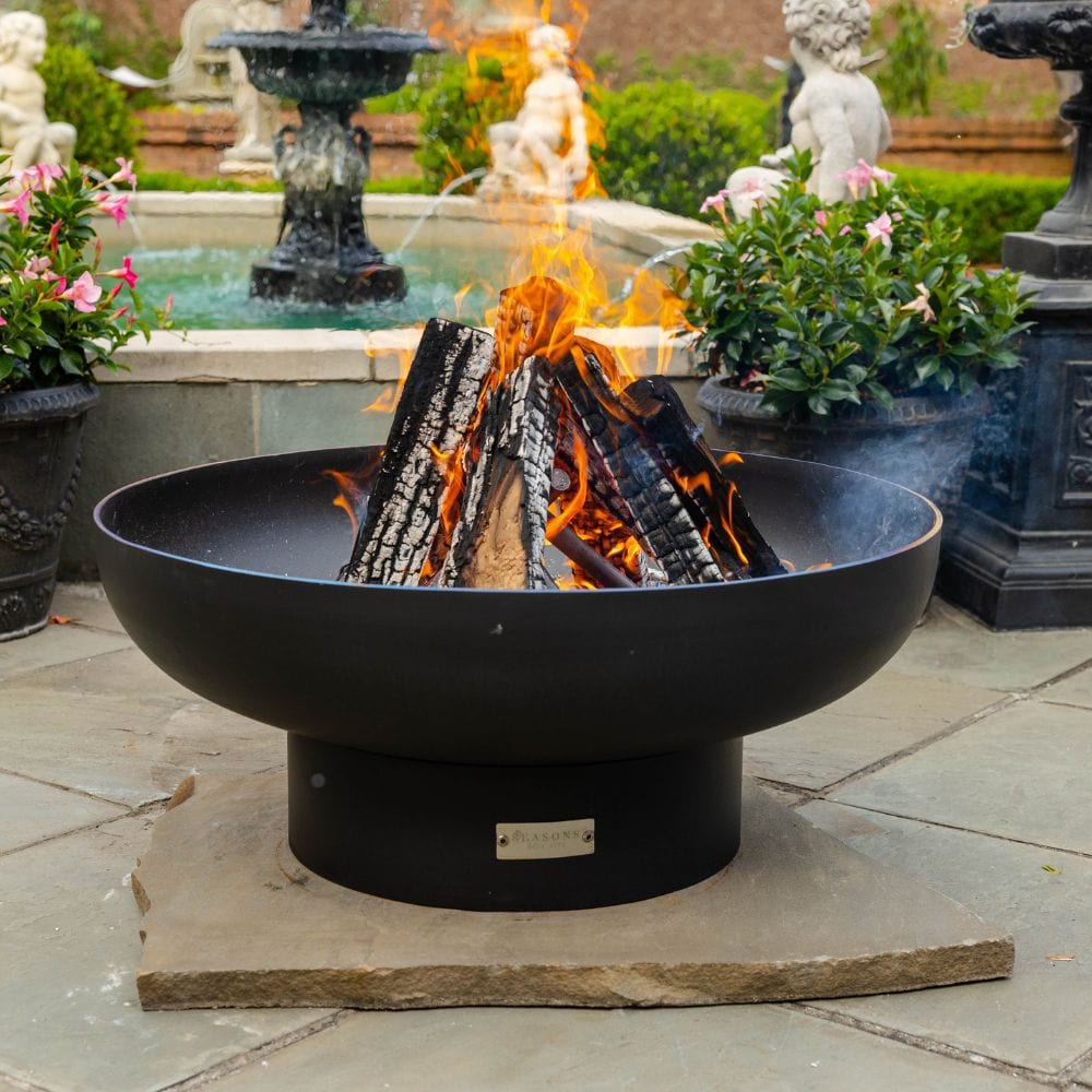 seasons fire pits elliptical steel fire pit at the backyard