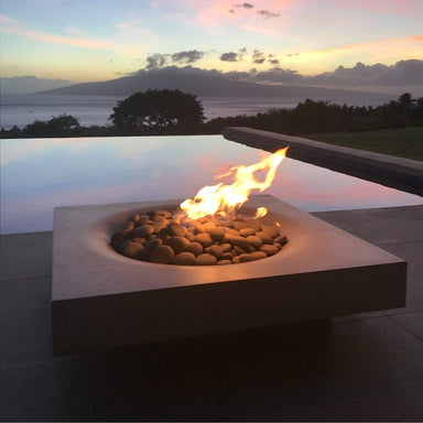 Solus Halo Low Square Concrete Gas Fire Pit in a cozy outdoor space