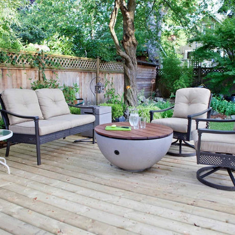 solus round hardwood tabletop on a hemi fire pit