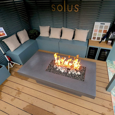 Solus Tavolo 68-Inch Linear Concrete Gas Fire Pit on a composite deck